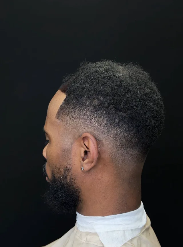 Line-up on dark hair, side profile, cut at BR Barber Lounge